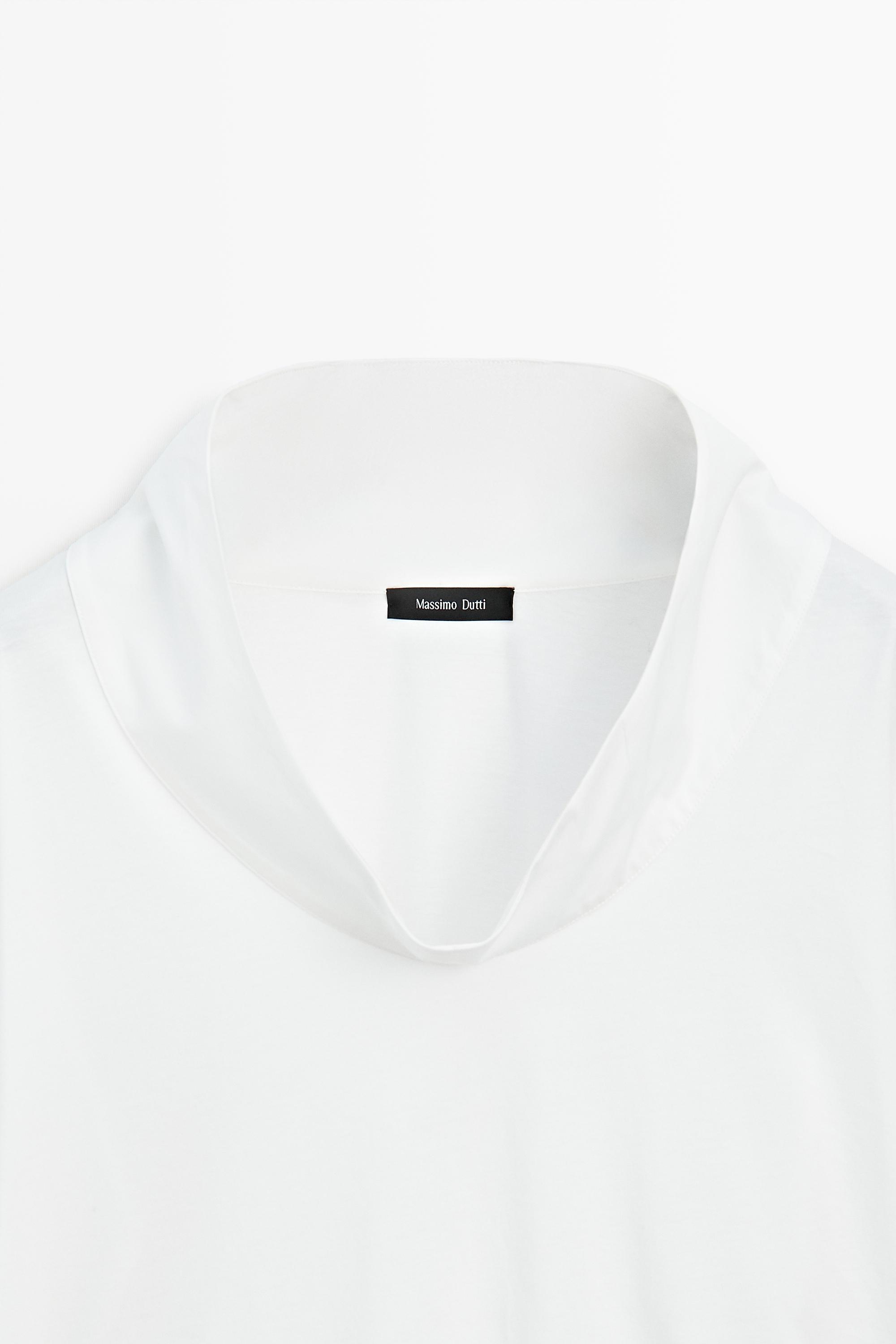 Blouse en coton à col ouvert et manches courtes